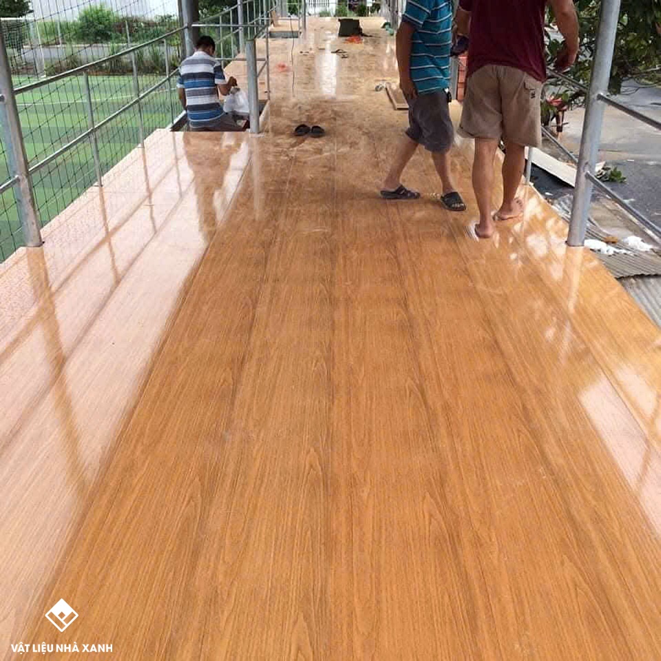 thi cong tam san nhua chiu luc lam san gac 116