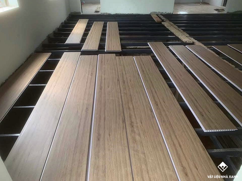 thi cong tam san nhua chiu luc lam san gac 5